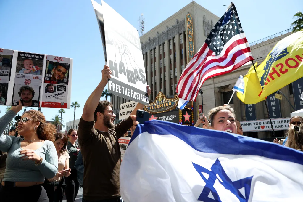 Pro-Israel demonstrators protesting in front of the El Capitan Theater during Israeli actress Gal Gadot's Hollywood Walk of Fame Star Ceremony.