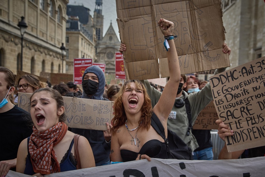 Protesters rally in a street demonstration over learning conditions in Paris.