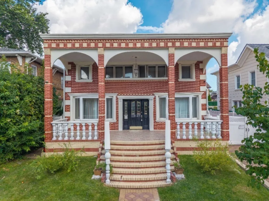 The Forest Hills home is heading to federal auction with bidding starting at $900,000.