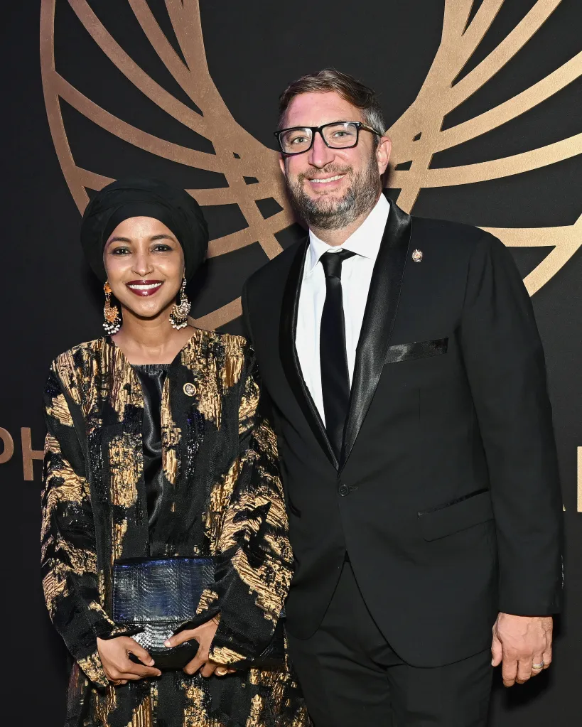 Representative Ilhan Omar and Tim Mynett pose for a photo at the Congressional Black Caucus Foundation's Phoenix Awards.