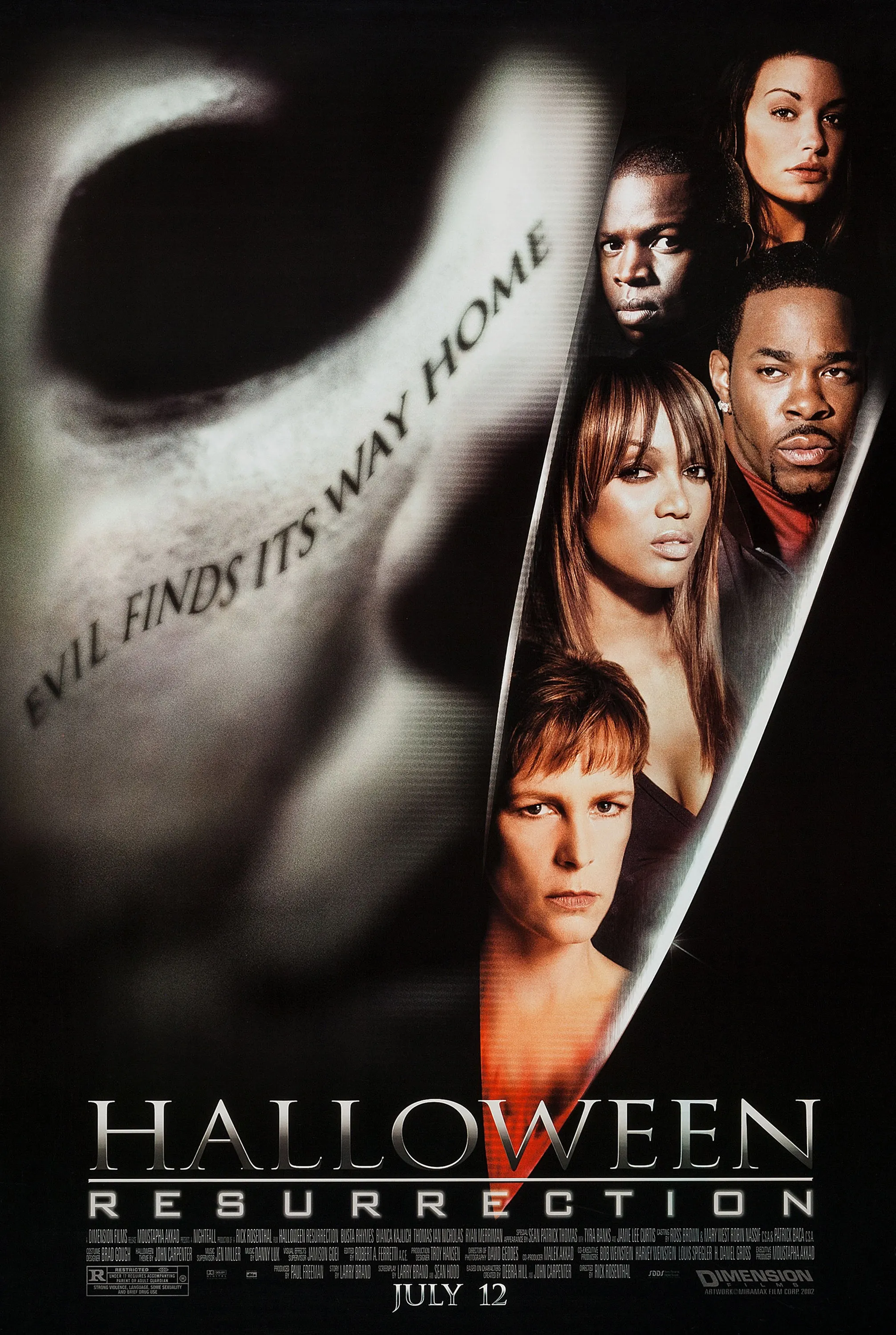 Movie poster for Halloween: Resurrection, featuring the faces of the main cast lined up inside a knife blade with the killer's face in the background.