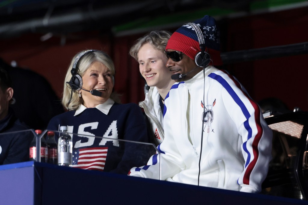 Martha Stewart, Ilia Malinin, and Snoop Dogg seated together at the event.