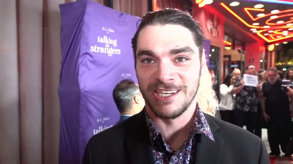 Actor RJ Mitte speaks at the premiere of his film Talking To Strangers.