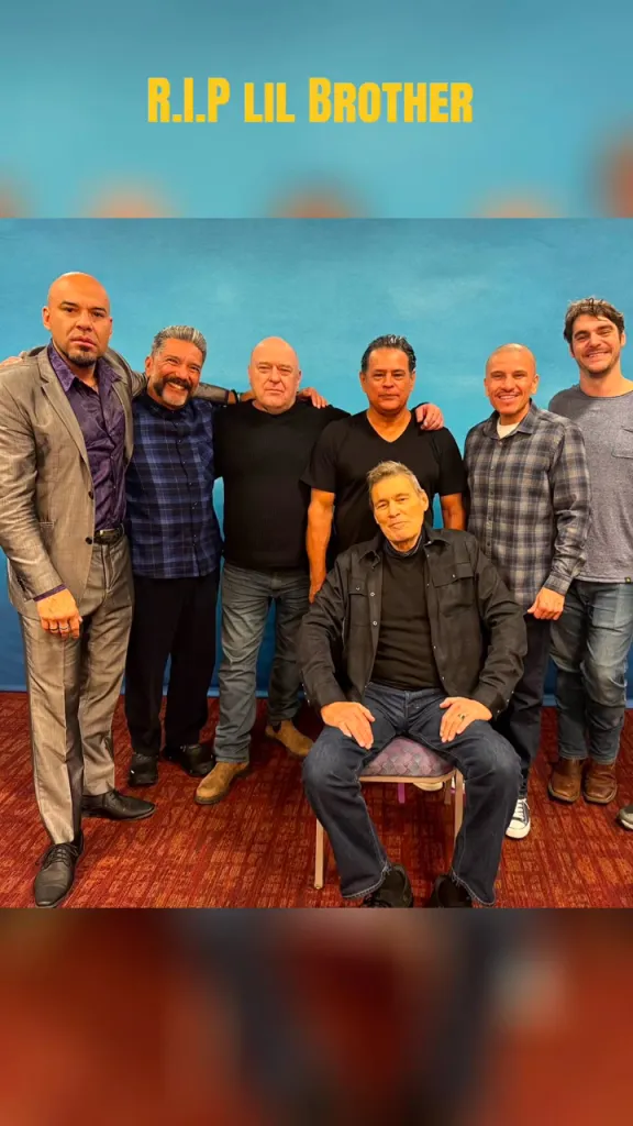 Breaking Bad cast members posing together, with 