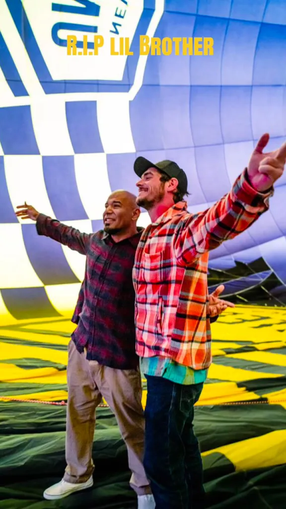 Actors Luis and Daniel Moncada standing in front of a hot air balloon with text reading 