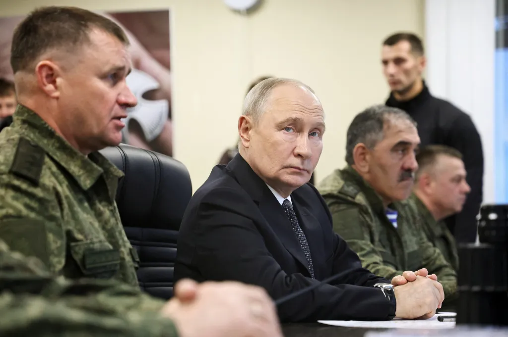 Russian President Vladimir Putin observes the Centre-2026 military exercises next to Deputy Defence Minister Yunus-Bek Yevkurov and Commander-in-Chief of the Russian Ground Forces Andrei Mordvichev at the Chebarkul range.