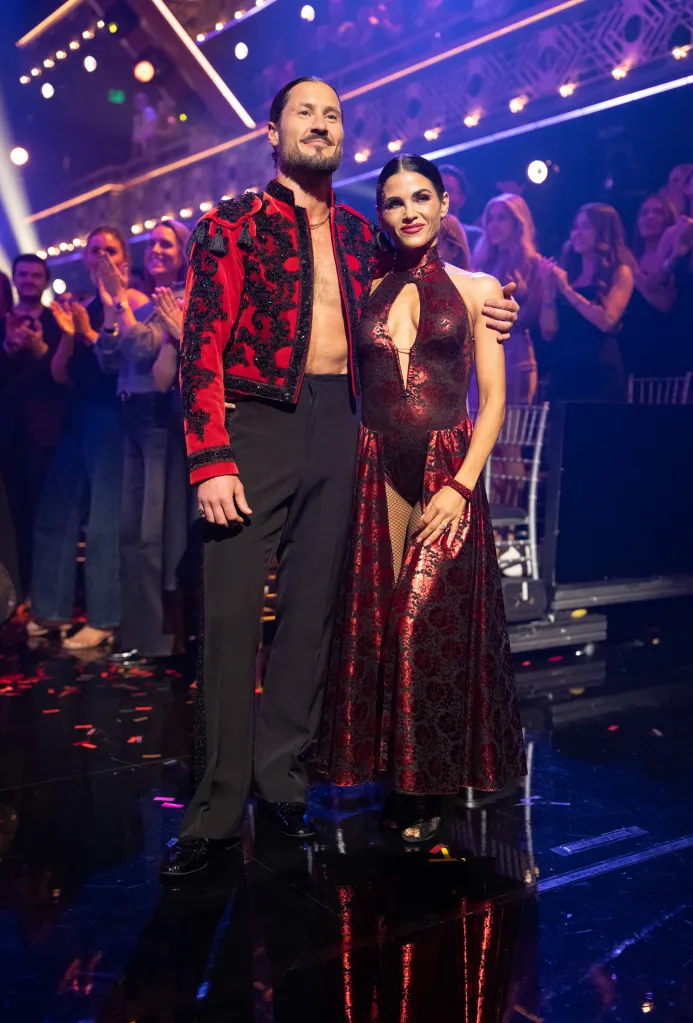 Valentin Chmerkovskiy and Jenna Dewan pose on the ballroom floor during 