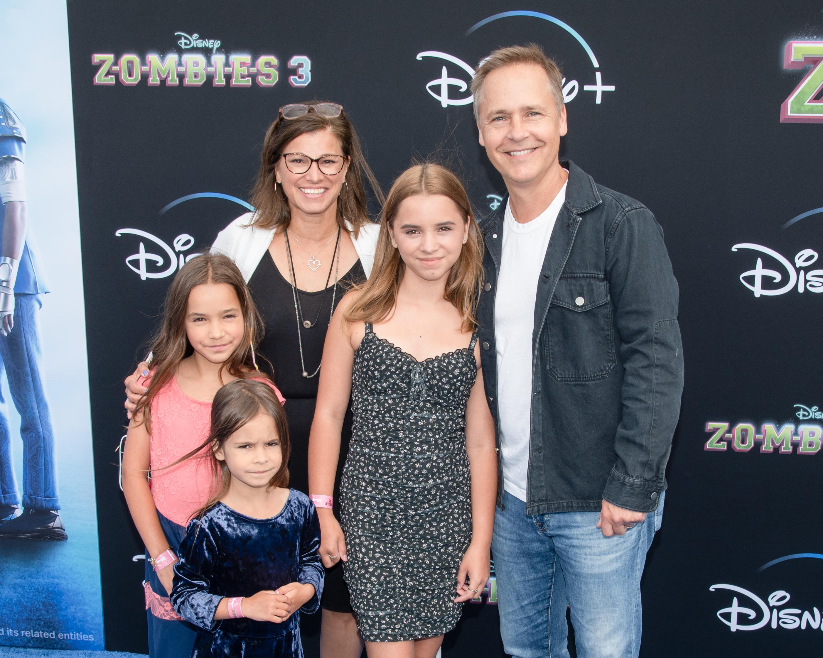 Chad Lowe, Kim Painter, and their children, including Fiona Lowe, pose together on a red carpet.