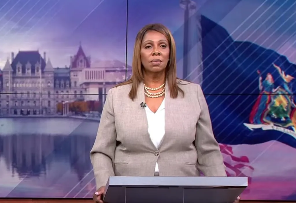 Letitia James stands behind a podium during an attorney general debate.
