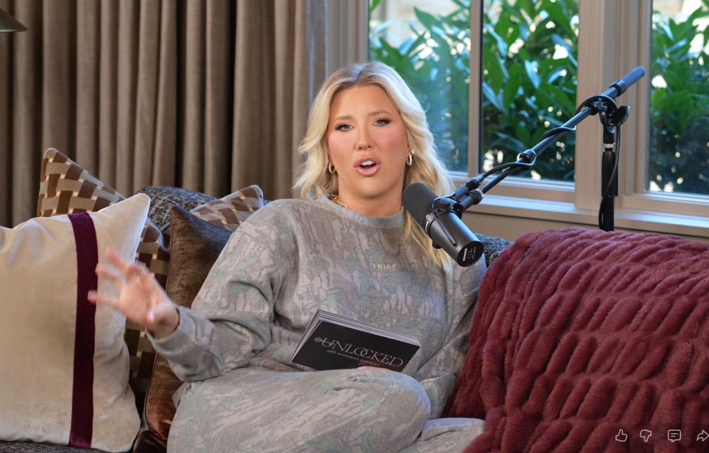 Savannah Chrisley sitting on a couch in a studio, speaking into a microphone.