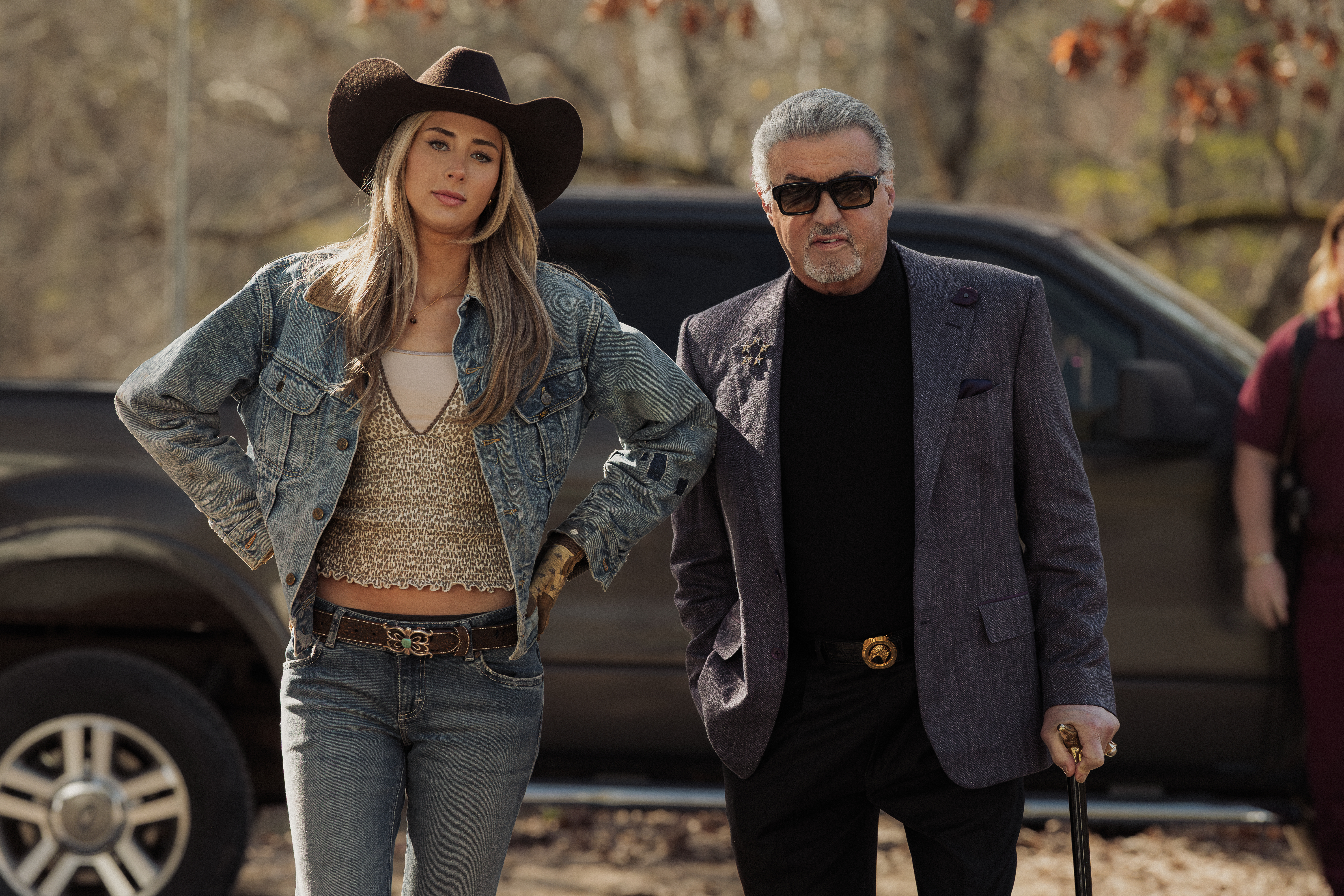 Scarlet Stallone as Spencer and Sylvester Stallone as Dwight Manfredi