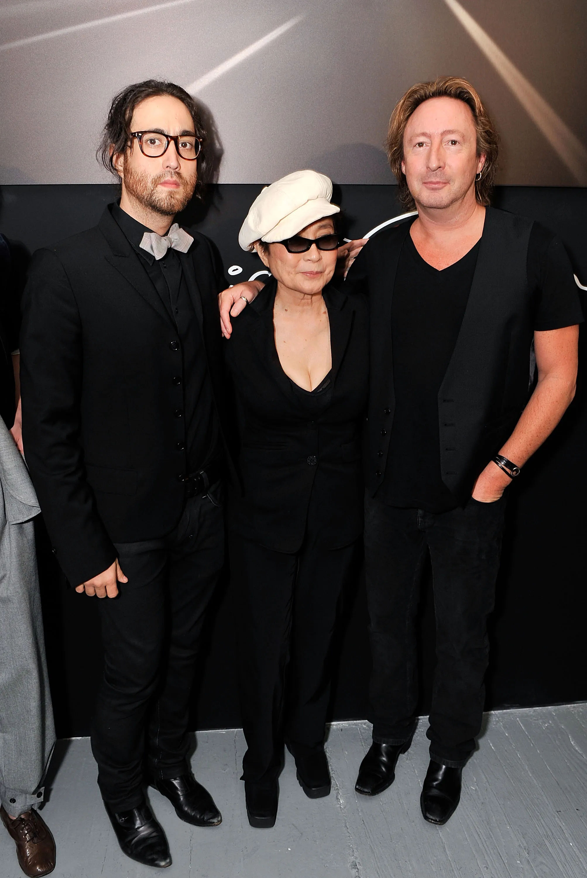 Sean Lennon, Yoko Ono, and Julian Lennon pose together at the 
