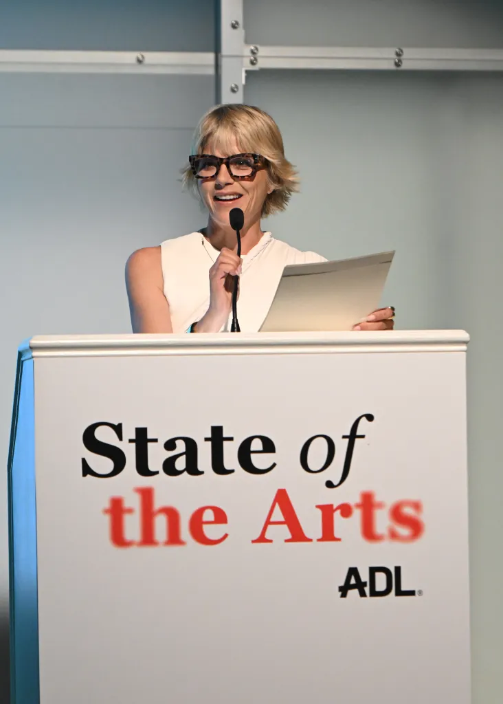 Selma Blair speaks at a podium during the ADL State of the Arts event.