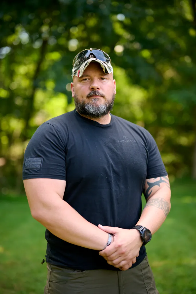 Sgt. Aaron Zaliponi of the Adams Township Police Department in a portrait outdoors.