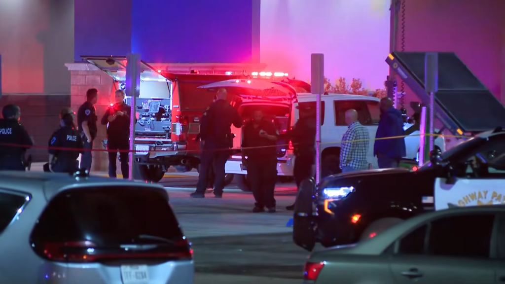 Emergency response vehicles and police officers at the scene of a shooting near Solano Town Center in Fairfield, California.
