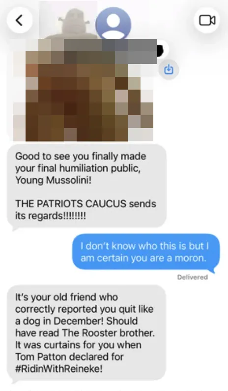 A screenshot of a text message conversation where the sender insults the recipient and the recipient responds by calling them a moron.