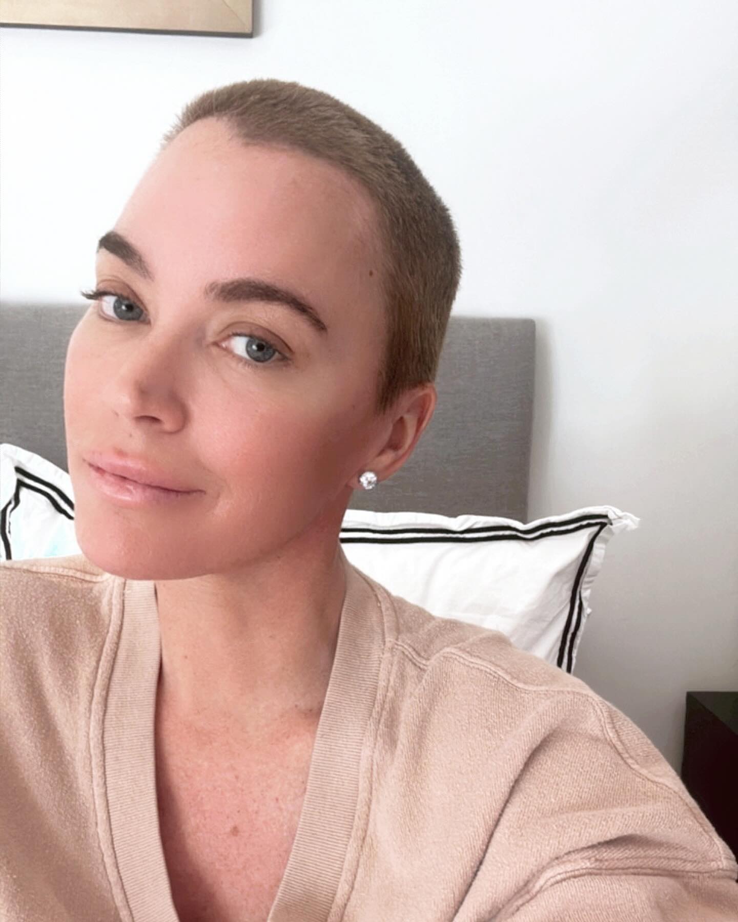 Teddi Mellencamp with a short buzz cut.