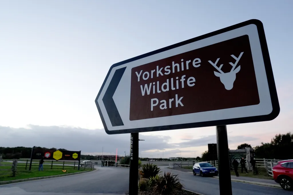 A brown road sign for Yorkshire Wildlife Park near Doncaster, England.