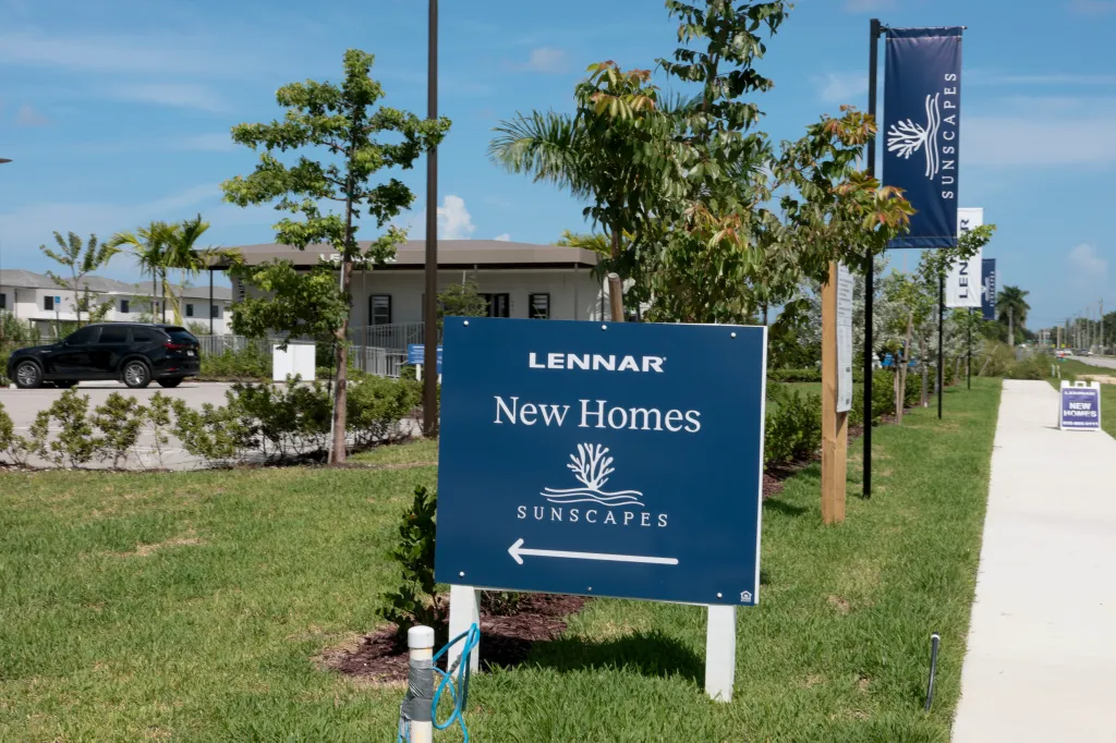 Signs advertising new homes for sale.