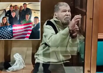 Sister of American held in Russia says he didn’t know he was being released until he saw US flag