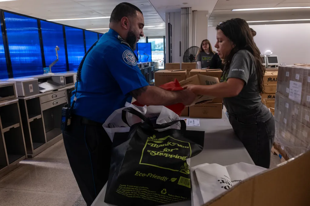 Federal workers receiving food parcels at Newark Liberty International Airport amid a government shutdown.