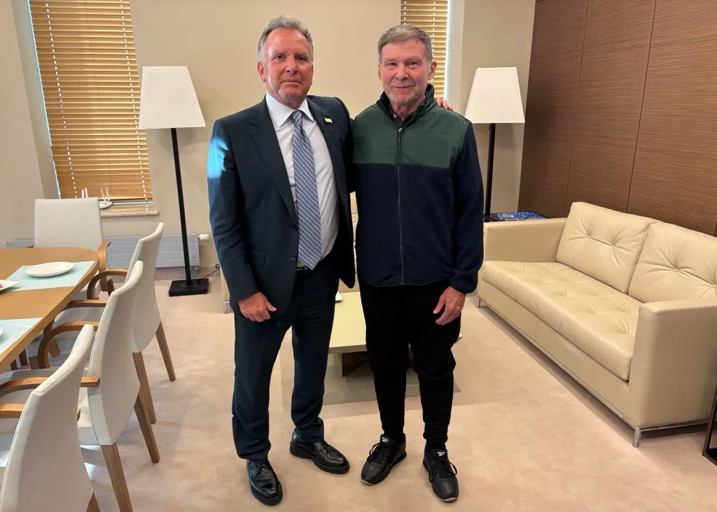 Stephen Hubbard poses for a picture with US Special Envoy Steve Witkoff after he was released from a Russian prison on Oct. 21, 2026.