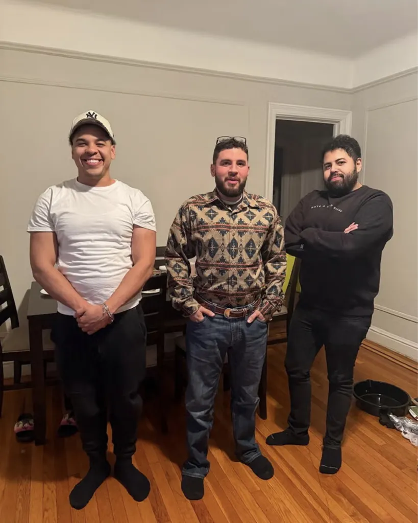 Darrel Rodriguez poses with his brothers Derick and Gabriel.