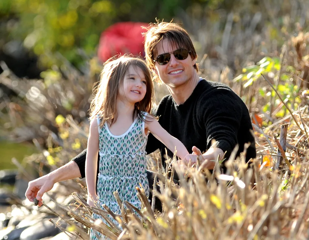 Tom Cruise and Suri Cruise visit Charles River Basin.