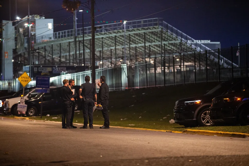 The Tallahassee Police Department investigates the scene of a shooting on Perry Street, behind Bragg Memorial Stadium.
