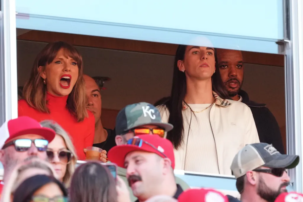 Taylor Swift and WNBA player Caitlin Clark watch a football game from a suite.