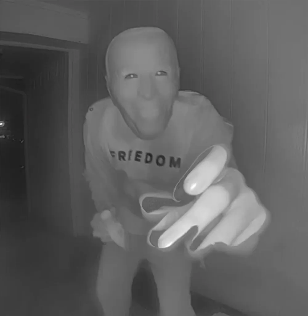 A person wearing a Biden mask and a 