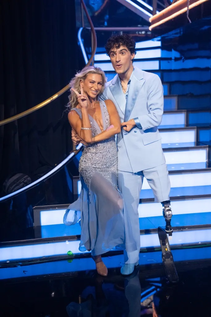 Daniella Karagach and Ezra Frech pose on the set of