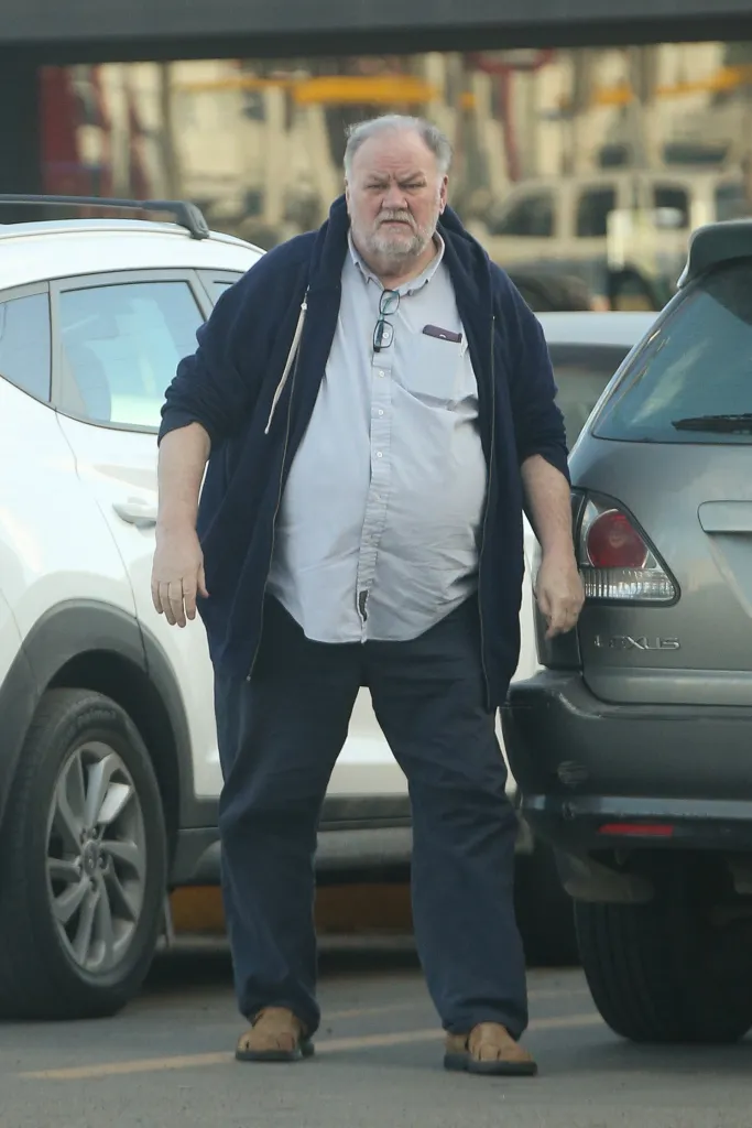 Thomas Markle standing in a parking lot between cars in Baja, Mexico.