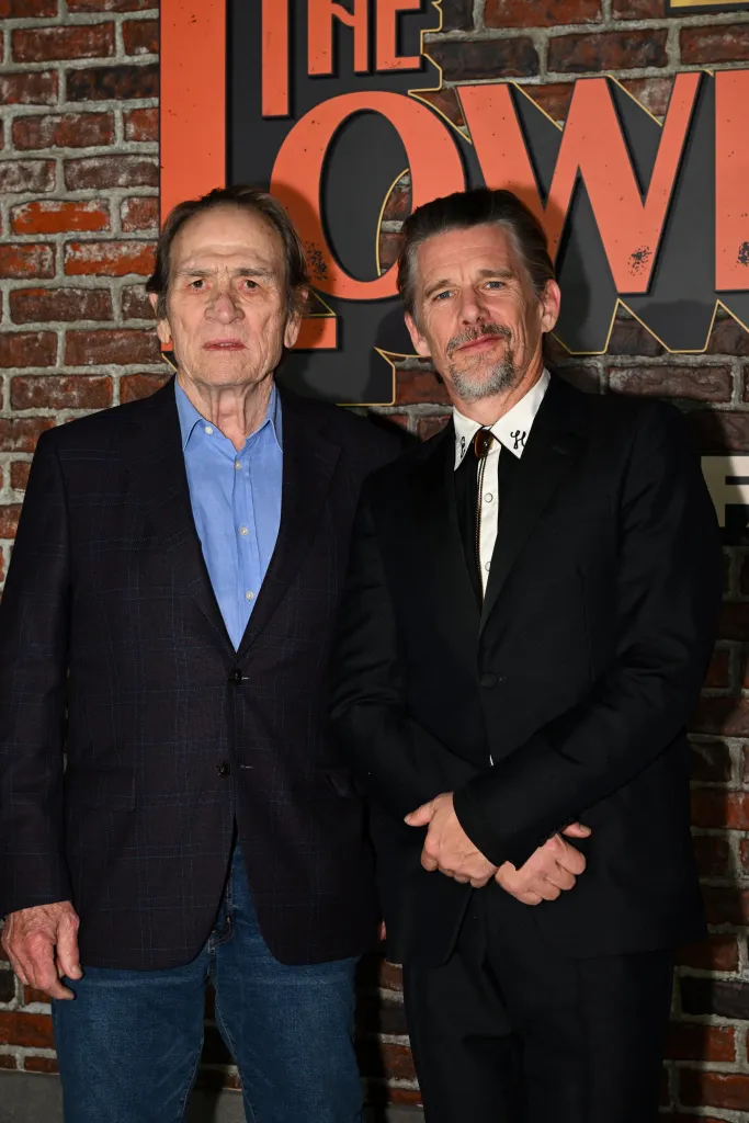 Tommy Lee Jones and Ethan Hawke stand together on the red carpet at FX's 