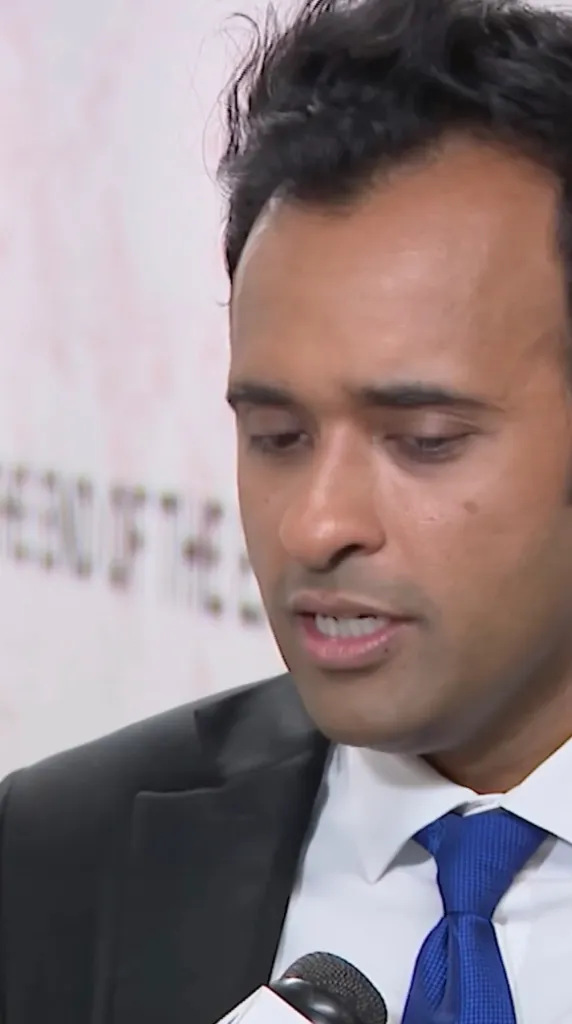 Vivek Ramaswamy speaking into a microphone.