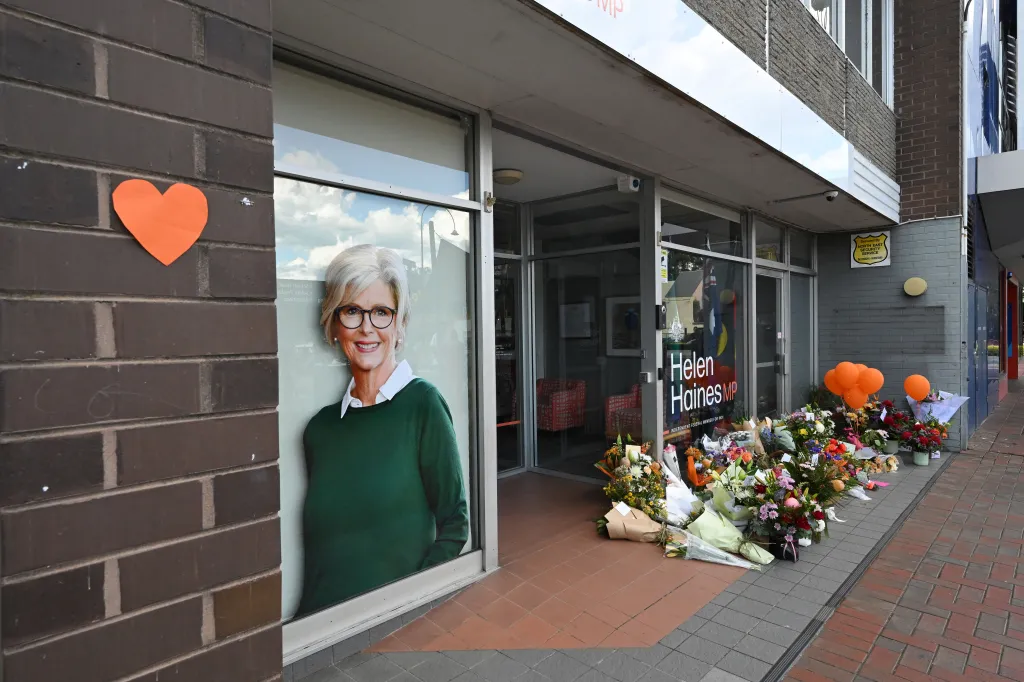 Tributes and flowers outside the electoral office of independent Australian lawmaker Helen Haines in Wangaratta.
