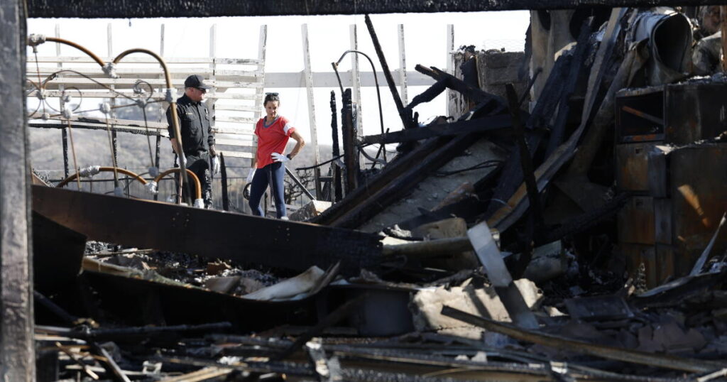 Southern California fires ease as Santa Ana winds die down. But rain could bring new risks