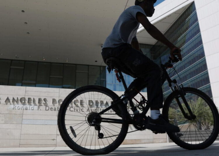 LAPD officer arrested after dragging romantic partner into street at gunpoint