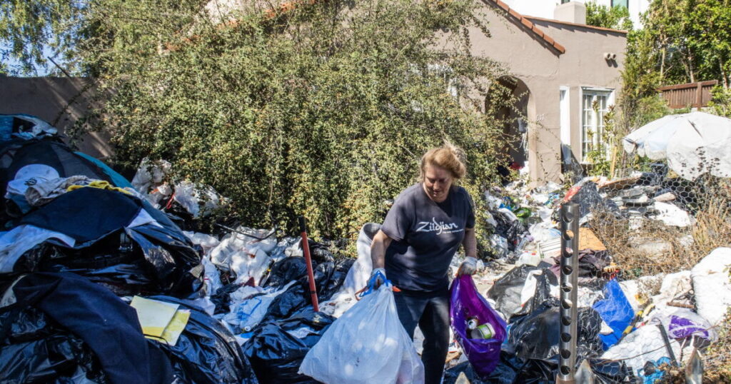 L.A.’s notorious ‘trash house’ is overflowing again. Angry neighbors slam city inaction