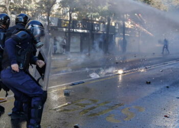 Albanian police clash with anti-government protesters for an 8th day