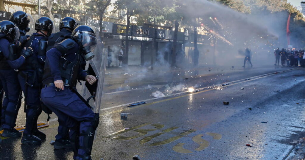 Albanian police clash with anti-government protesters for an 8th day