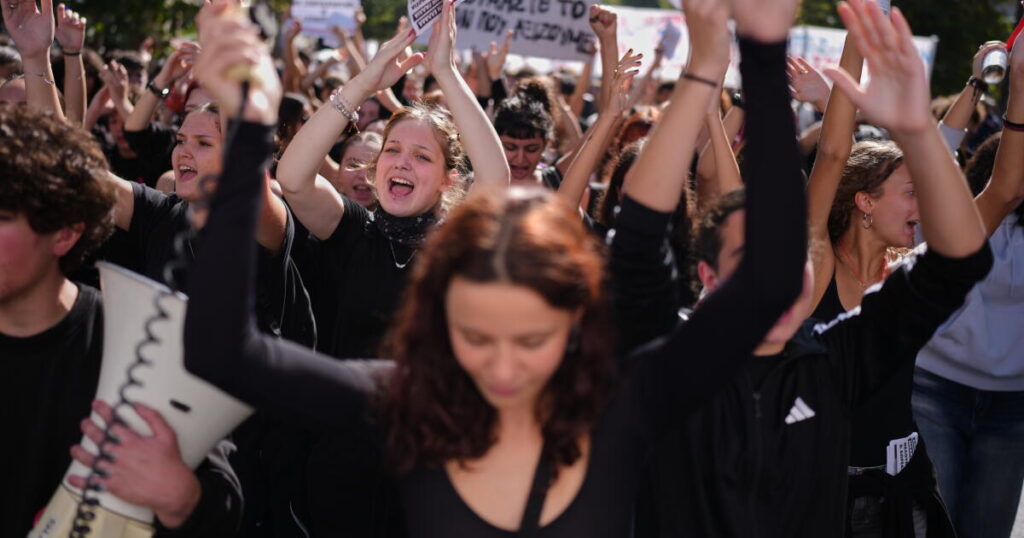 Thousands of students and teachers march through Greek capital to protest high cost of living