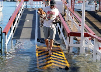 El Niño flooding grips Newport Beach in a vise. ‘Mother Nature comes to collect some tax’
