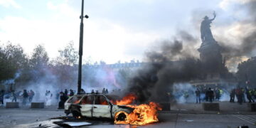 Clashes and fires break out as protesters rally across France, joining students