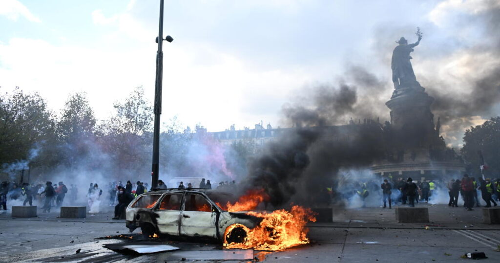 Clashes and fires break out as protesters rally across France, joining students