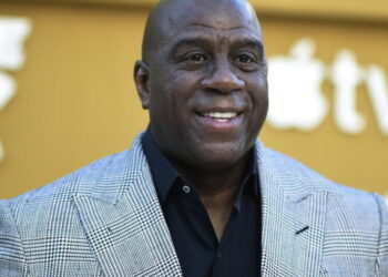 After federal subpoenas, Mark Walter tapped a Magic Johnson-linked firm for billions in loans
