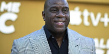 After federal subpoenas, Mark Walter tapped a Magic Johnson-linked firm for billions in loans