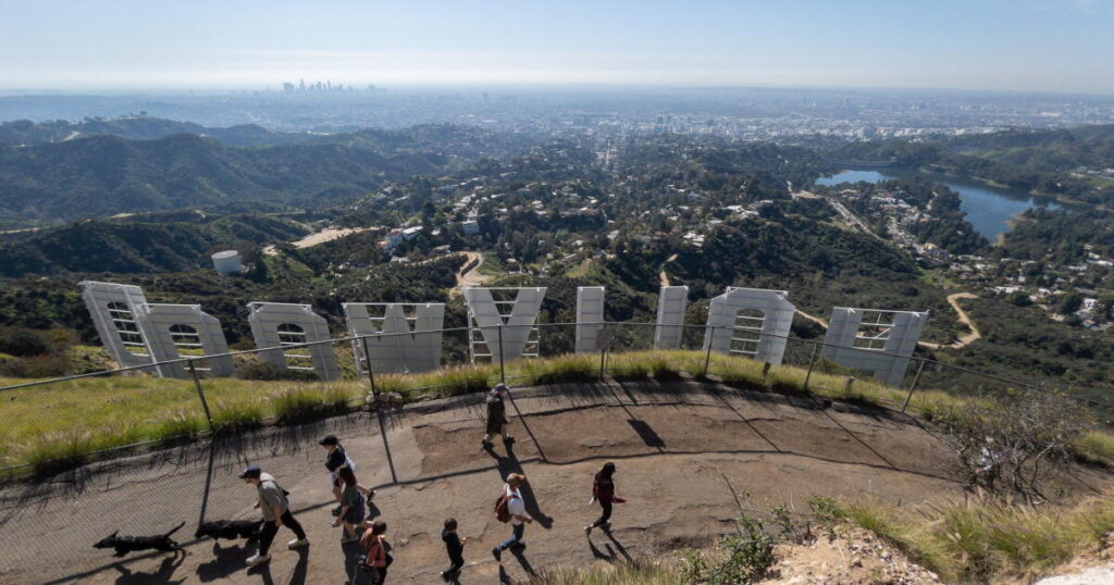 Living near Hollywood sign means cars, diapers, bottles of urine. Neighbors say they’ve had it