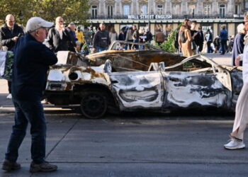 French police arrest 1,800 after violent clashes and looting mar protests