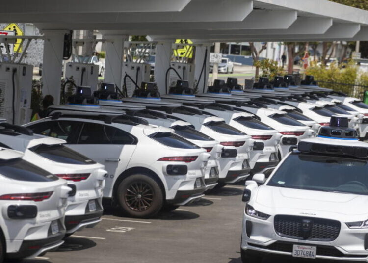 ‘They come in droves’: How robotaxis are hogging EV chargers in one corner of Southern California